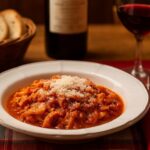 Wein zum Essen Trippa alla Fiorentina, Kutteln Florentiner Art, Vino Nobile di Montepulciano DOCG, florentinische Tischszene