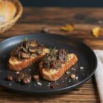 Wine with food Chestnut mushrooms, roasted wild mushrooms, Pinot Blanc Palatinate, garden table, autumn atmosphere